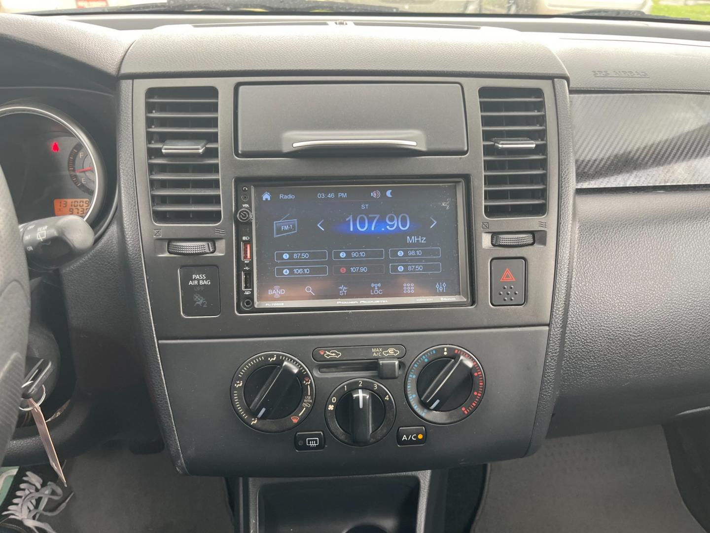 2009 SILVER /black Nissan Versa 1.8 S Hatchback (3N1BC13E09L) with an 1.8L L4 DOHC 16V engine, Manual transmission, located at 14700 Tomball Parkway 249, Houston, TX, 77086, (281) 444-2200, 29.928619, -95.504074 - Photo#14